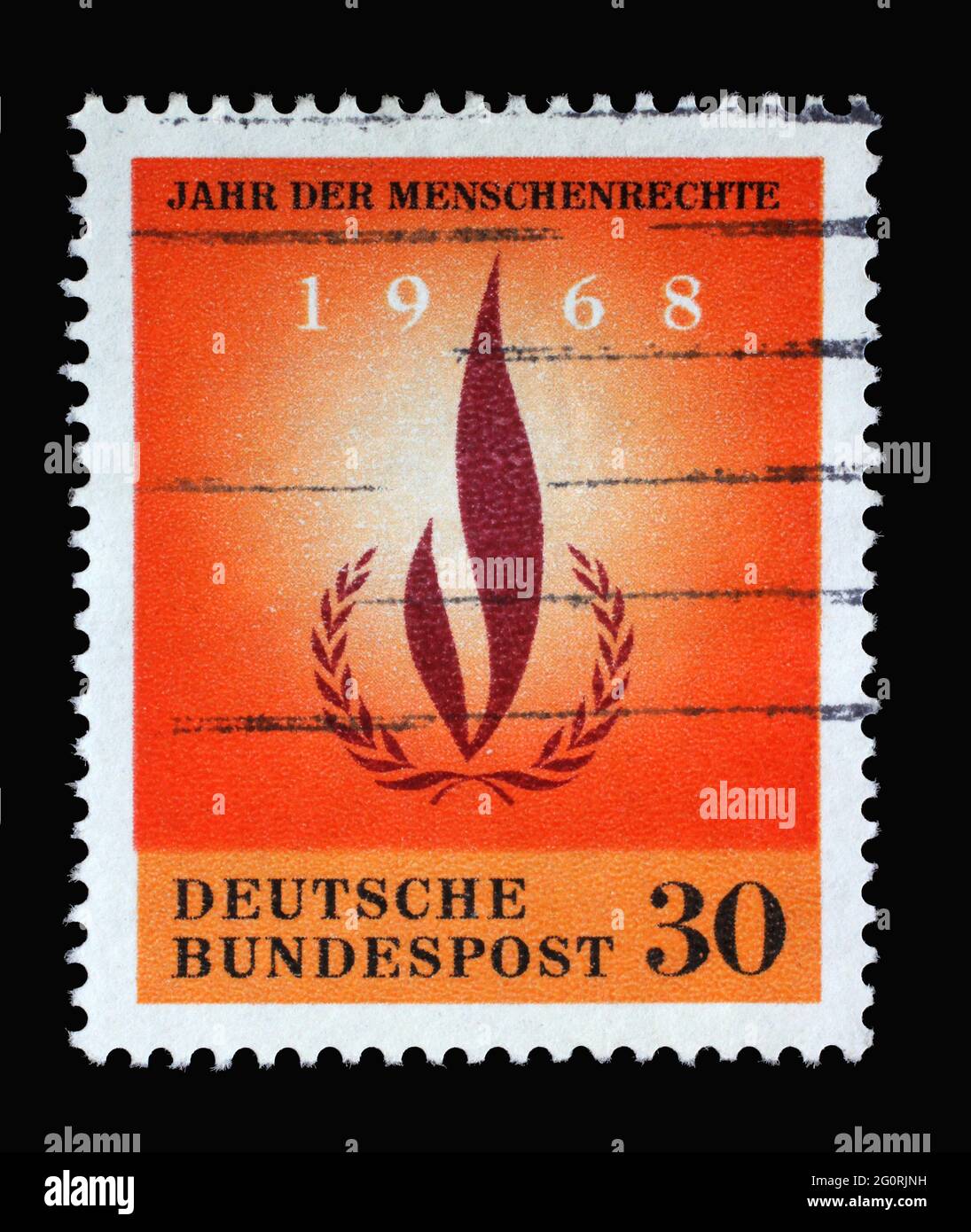 In Deutschland gedruckte Marke mit Lorbeer und Kranz, Jahr der Menschenrechte, um 1968 Stockfoto