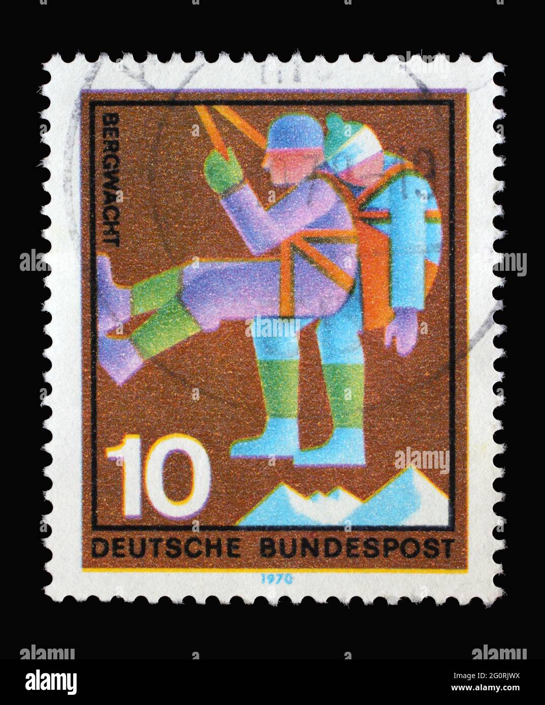Stempel gedruckt in Deutschland mit einem Rettungsdienst mit Verletzungen: Ehrenamtlicher Bergrettungsdienst, um 1970 Stockfoto