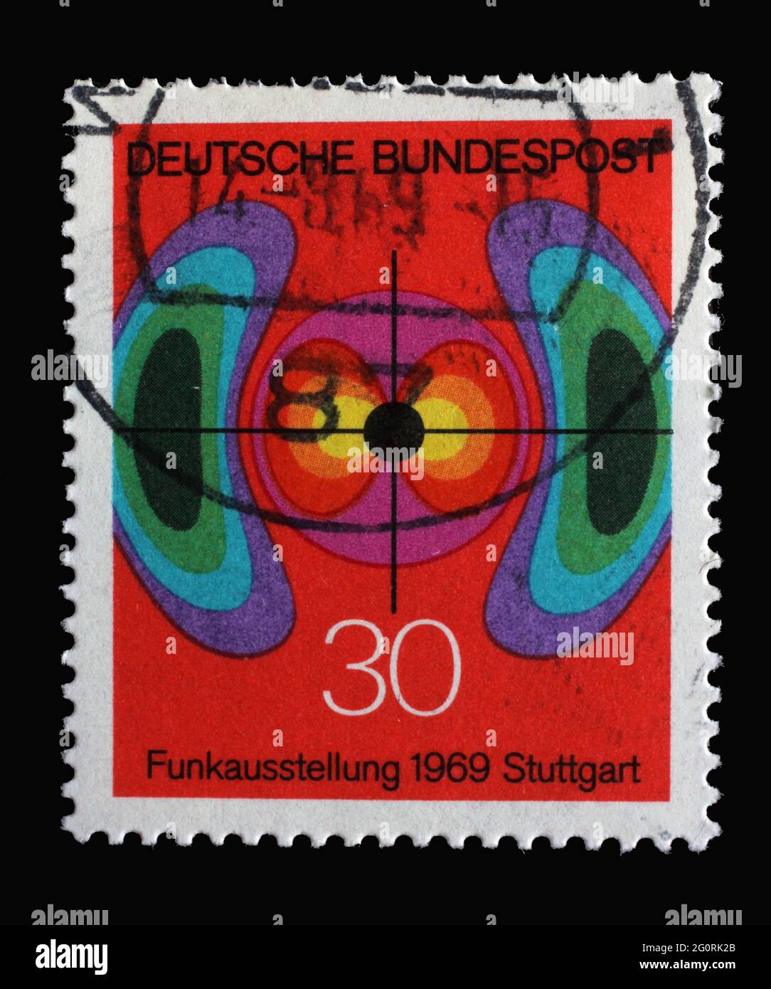 In Deutschland gedruckte Marke zeigt Diagramm des elektromagnetischen Feldes, Deutsche Radioausstellung in Stuttgart, um 1969 Stockfoto