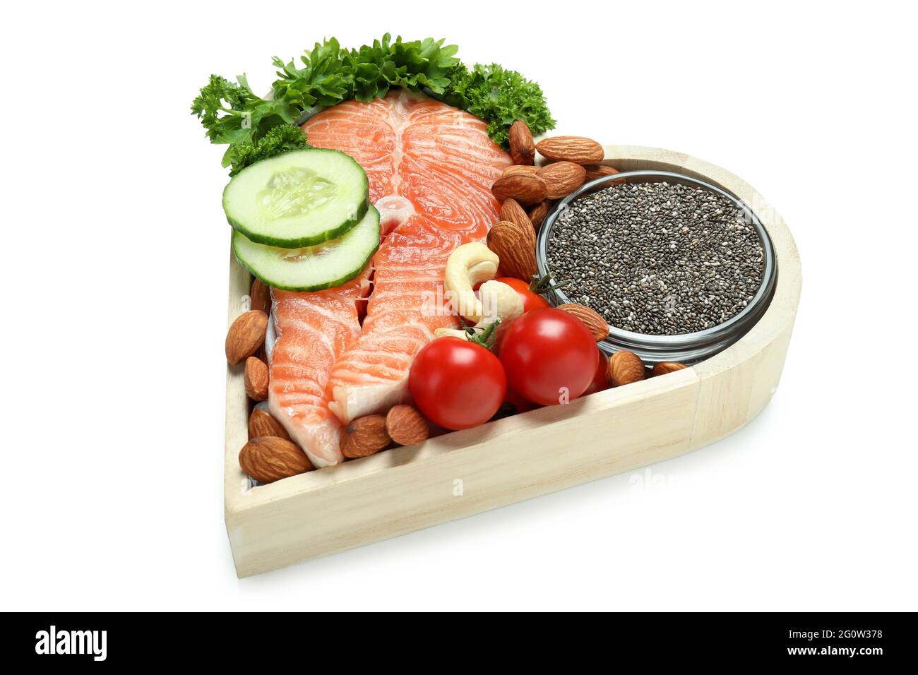 Gesunde Ernährung im Herzen isoliert auf weißem Hintergrund Stockfoto