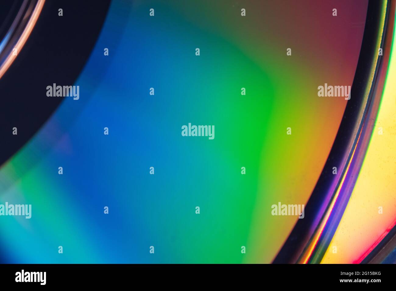 Abstraktes Foto der Spiegelung der Unterseite einer CD, das eine breite Palette von Farben auf seiner glänzenden Filmoberfläche zeigt. Fotos von verschiedenen Winkeln produci Stockfoto
