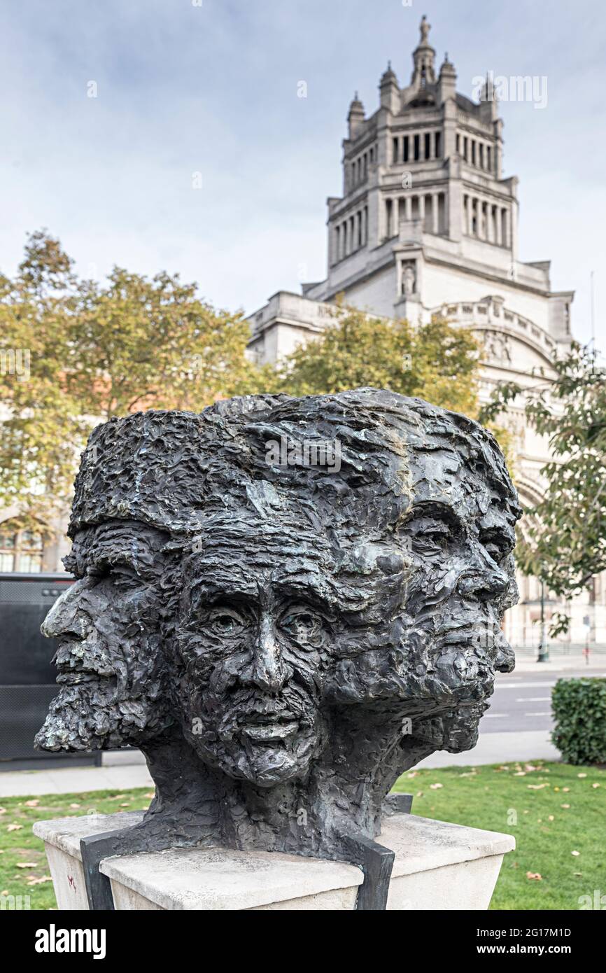 Zwölf Gesichter einer Bronzestatue, Kensington, London, Großbritannien Stockfoto