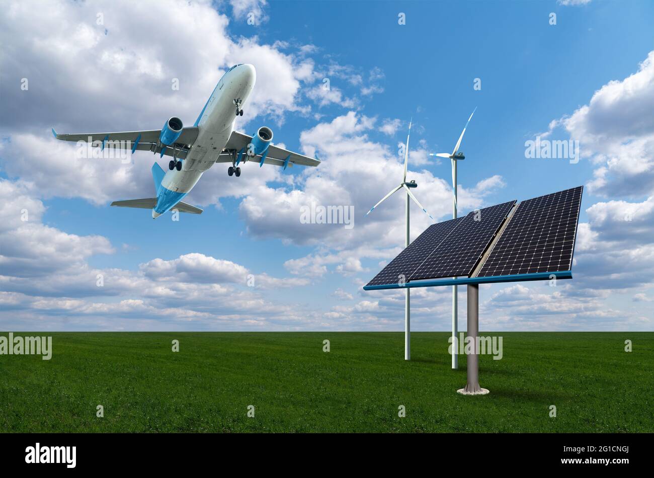 Landeflugzeug mit Sonnenkollektoren und Windturbinen. Sauberes Mobilitätskonzept Stockfoto