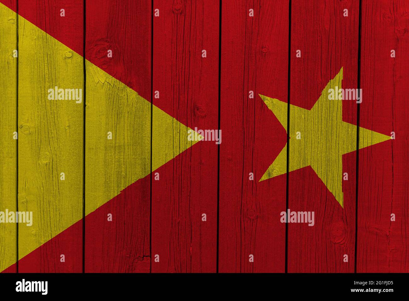 Die Nationalflagge der Region Tigray in Äthiopien wurde auf eine Holzwand gemalt. Stockfoto