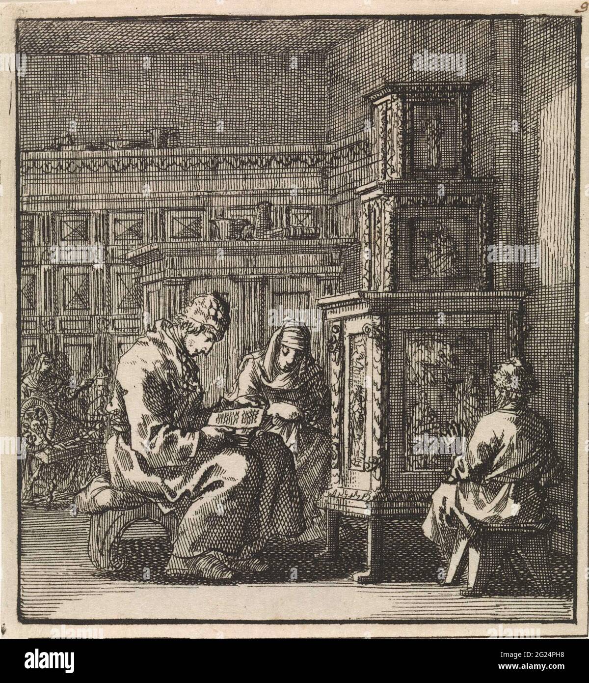 Drei Figuren wärmen sich an der Heizung; der Ofen. Stockfoto