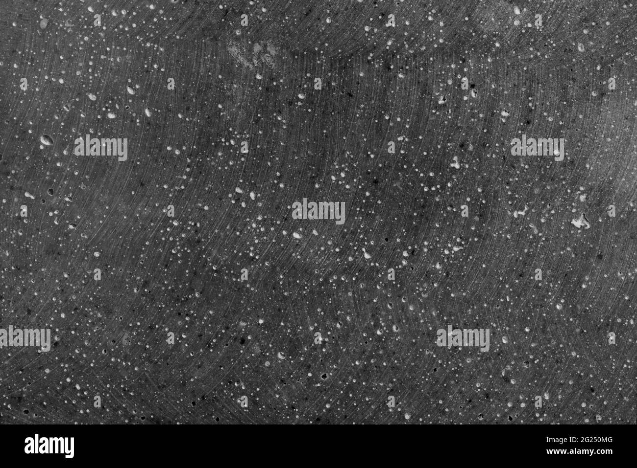Raue Oberfläche aus dunklem Stein, Hintergrund im Vollformat Stockfoto