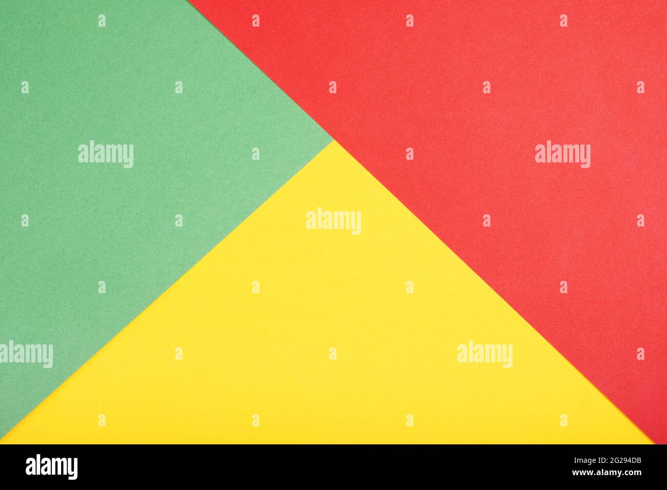 Lebendiger Papierhintergrund in Rot-Grün und Gelb Stockfoto