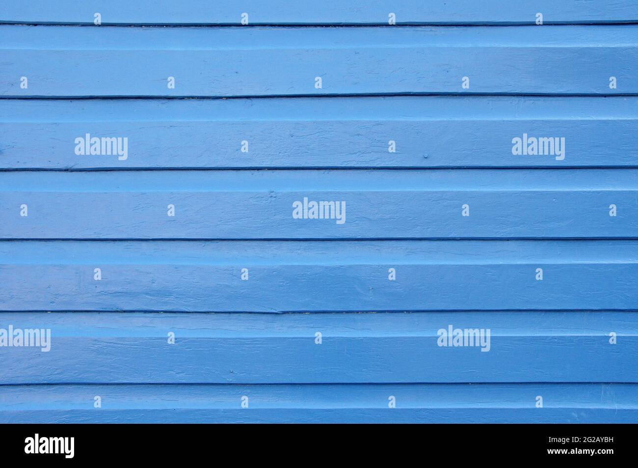 blauem Hintergrund Holz Stockfoto