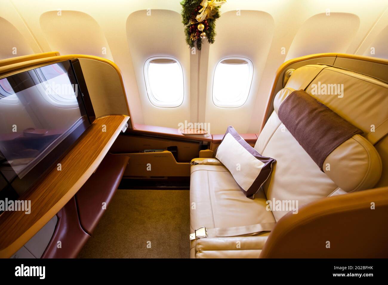 First Class-Sitz an Bord der Boeing 777 von Singapore Airlines Stockfoto