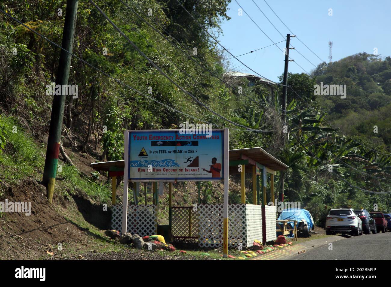 Grenada Billboard in der Nähe von Gouyave Plakat für Jugendaktion Notfallkomitee für Tsunami Stockfoto