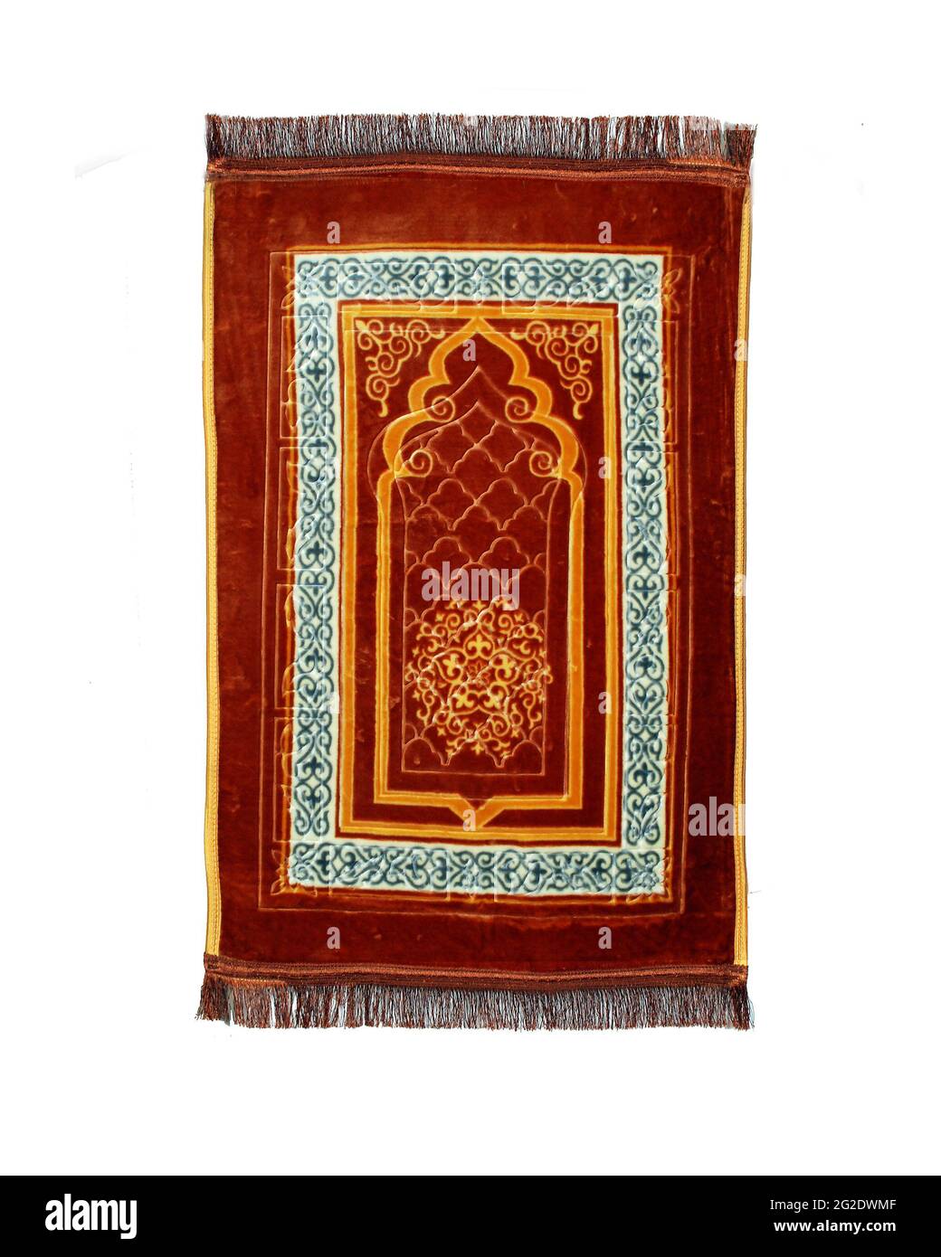Seidig weiche islamische Gebetsmatte isoliert auf weißem Hintergrund, helles und dunkles Farbdesign, Stofffaden Stockfoto