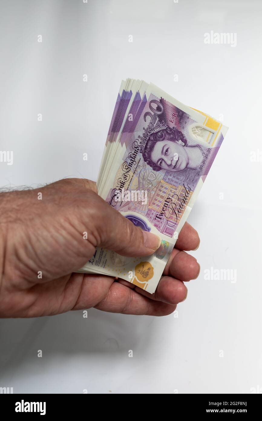 Faust voller Geld Stockfoto