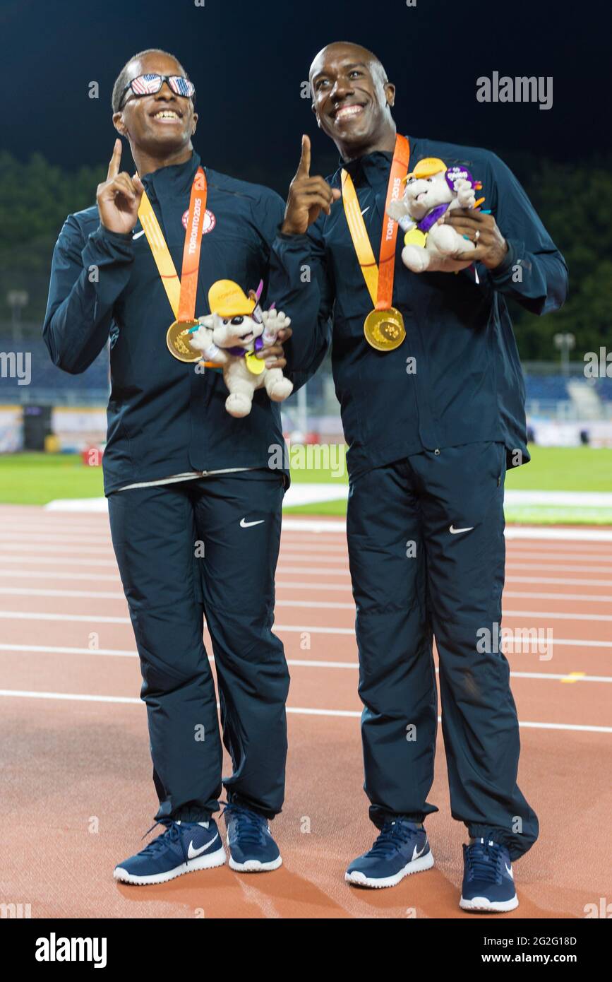 David Brown setzt neue Parapan bin Datensatz Timing 10,95 bei den Herren 100m T11 Finale während der parapan Am Spiele 2015 in Toronto. Sein Führer ist Jerome Ave Stockfoto