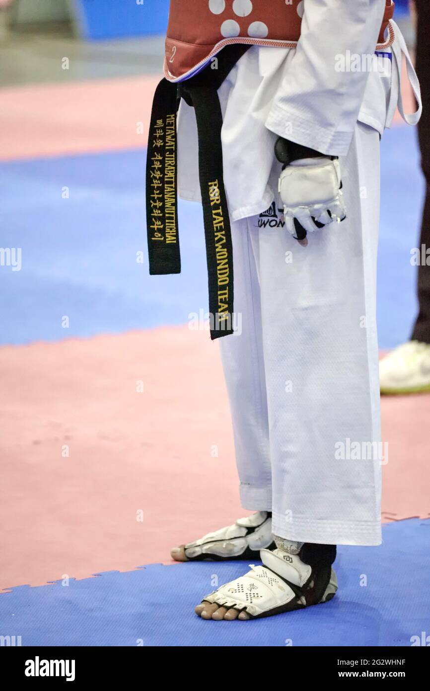 Taekwon-do-Konkurrent in der Kampfkunst „Schwarzer Gürtel“ Stockfoto