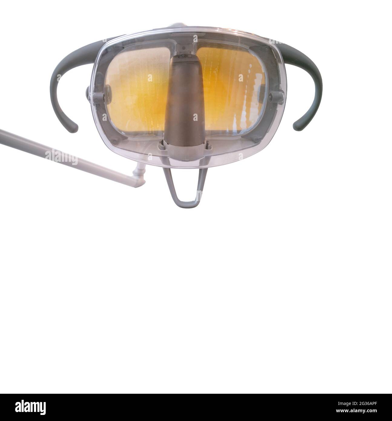 Zahnarztoberlampe auf weißem Hintergrund für Text Stockfoto