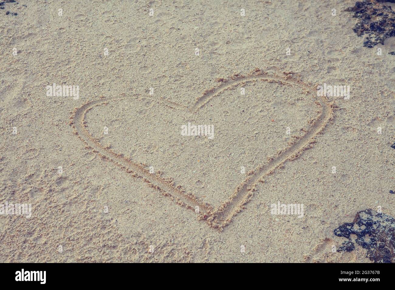 Herz in Sand gezeichnet Stockfoto