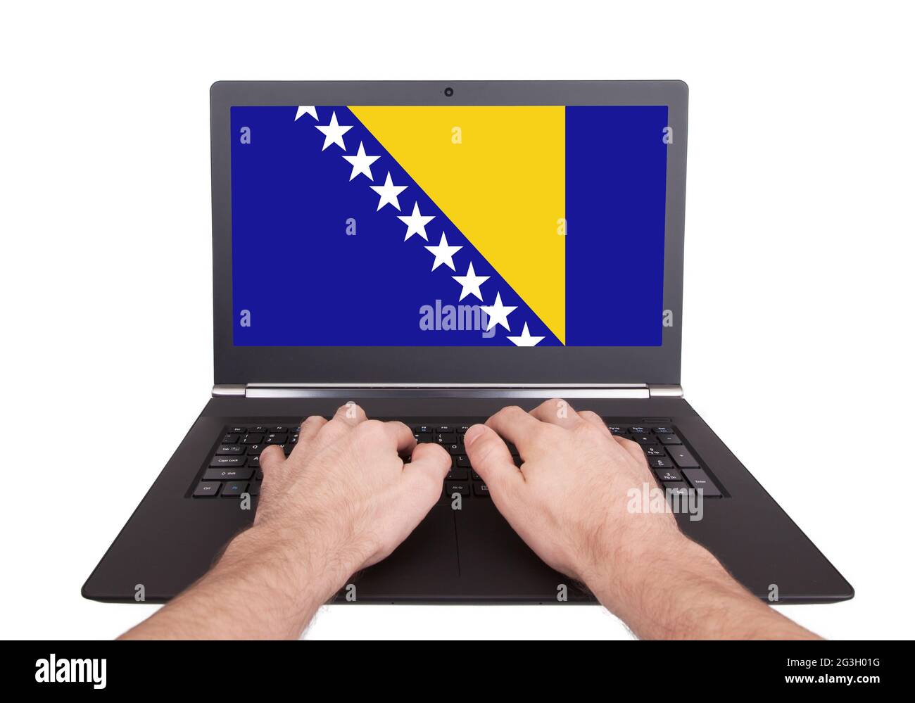 Hände arbeiten auf Laptop, Bosnien und Herzegowina Stockfoto