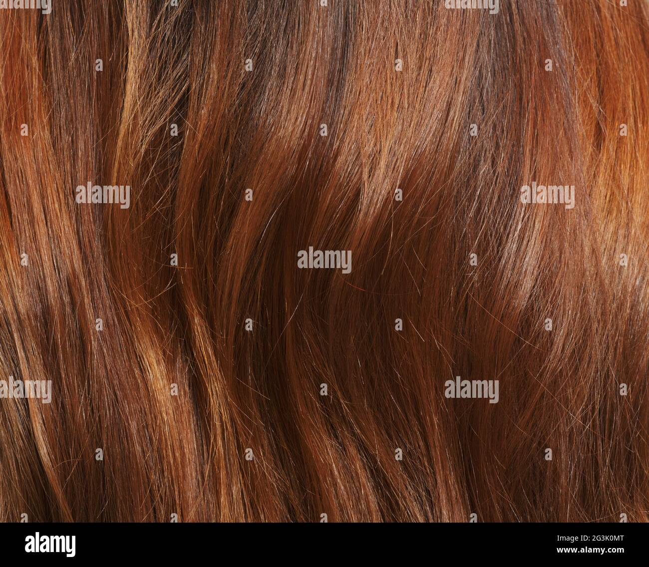 Lange braune Haare als Hintergrund Stockfoto