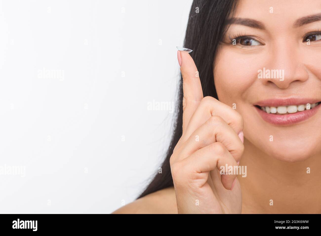 Frau mit Kontaktlinsen Stockfoto