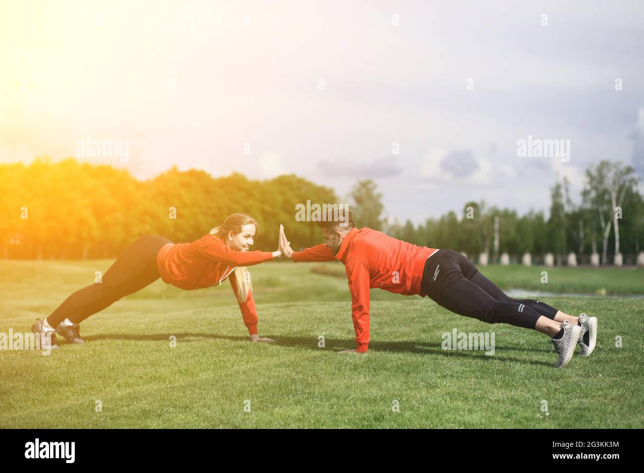 Sport-Mann und Frau im park Stockfoto