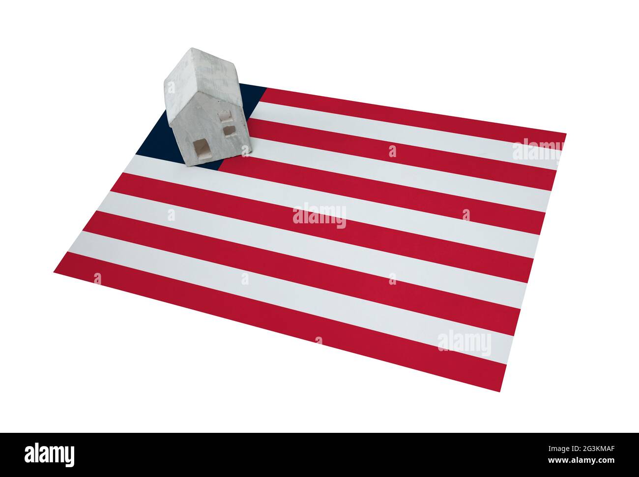 Kleines Haus auf einer Flagge - Liberia Stockfoto