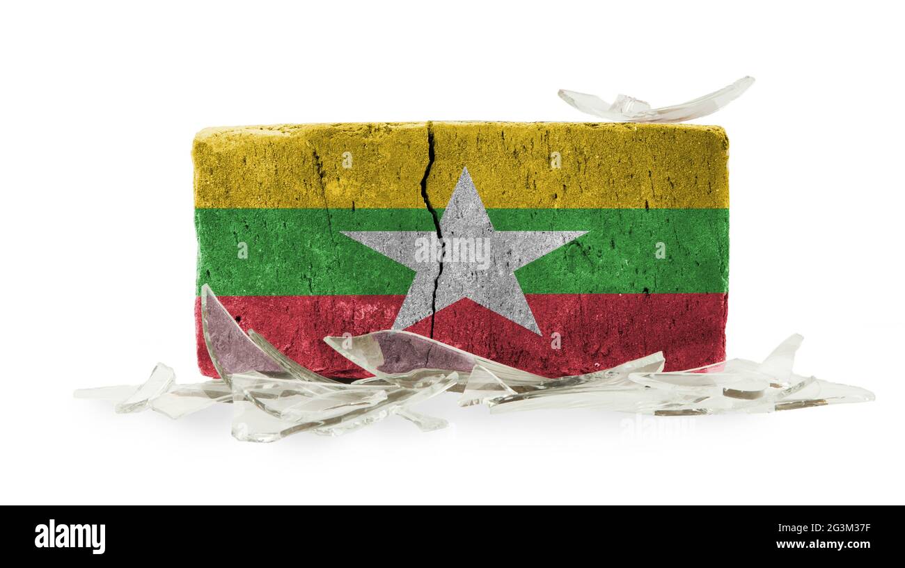 Ziegel mit Glasscherben, Gewalt-Konzept Stockfoto