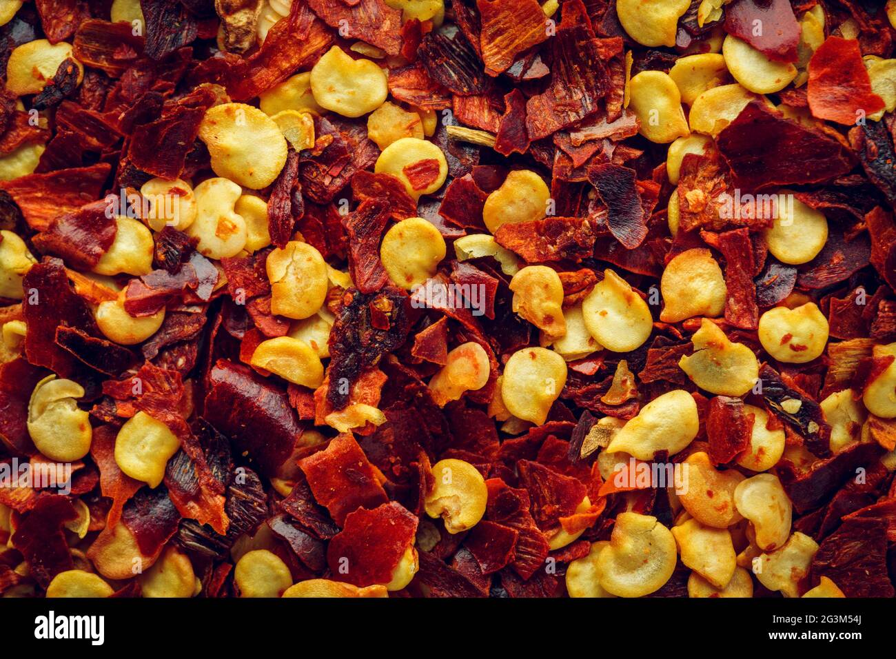 Crushed red chili Makro Hintergrund Stockfoto