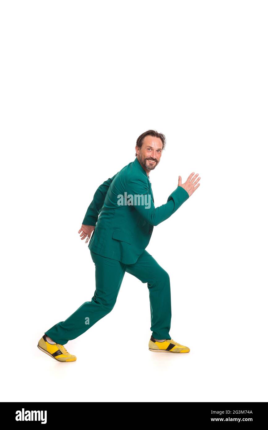 Schöner Mann im grünen Anzug Stockfoto