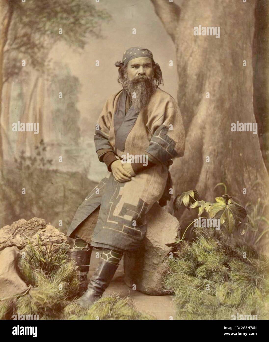 Alte Kusakabe Kimbei Fotografie aus dem alten Japan - Ainu Mann Stockfoto