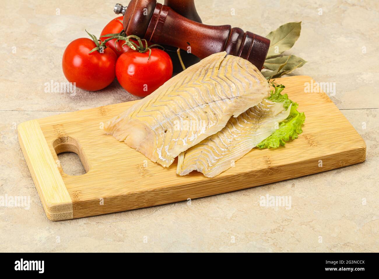 Rohes Kabeljau Fischfilet zum Kochen Stockfoto
