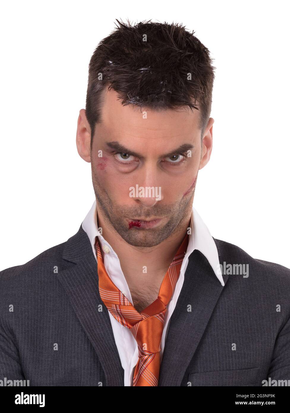 Nahaufnahme eines Geschäftsmannes mit blutiger Lippe, geschlagen und gequetscht Stockfoto