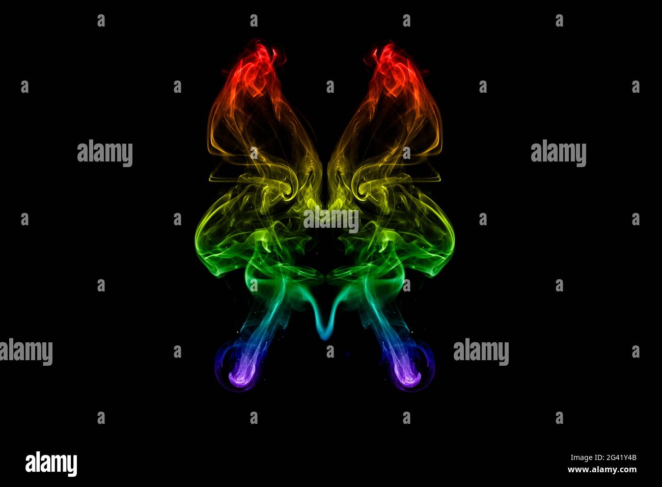 Farbenfroher Rauch mit Schmetterlingsform Stockfoto