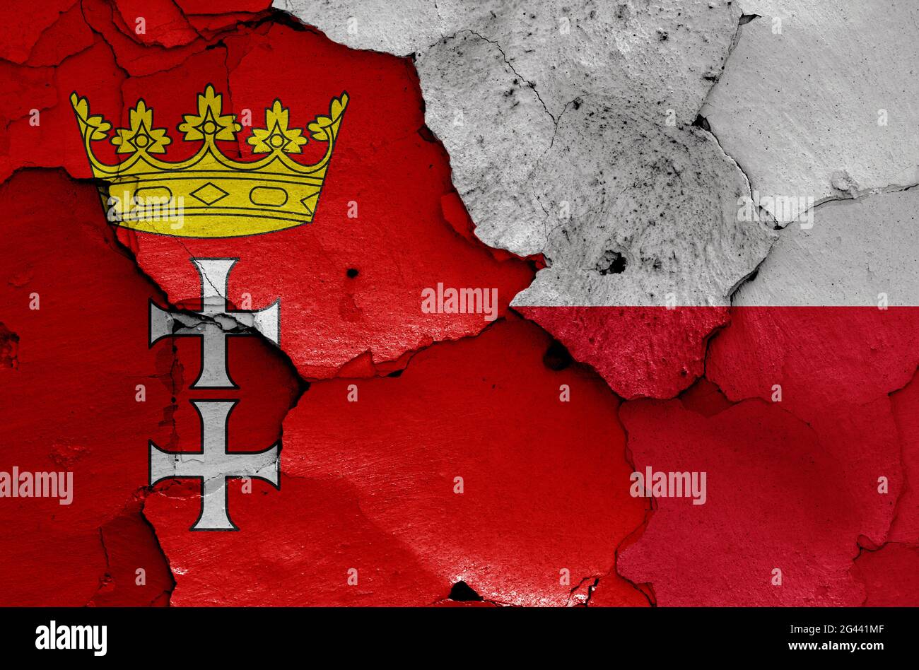 Flaggen von Danzig und Polen auf rissige Wand gemalt Stockfoto