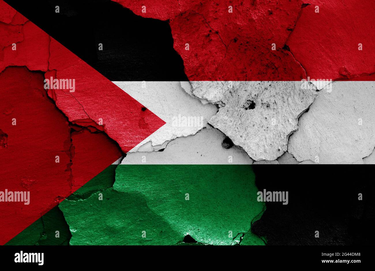 Flaggen von Palästina und Jemen auf rissige Wand gemalt Stockfoto