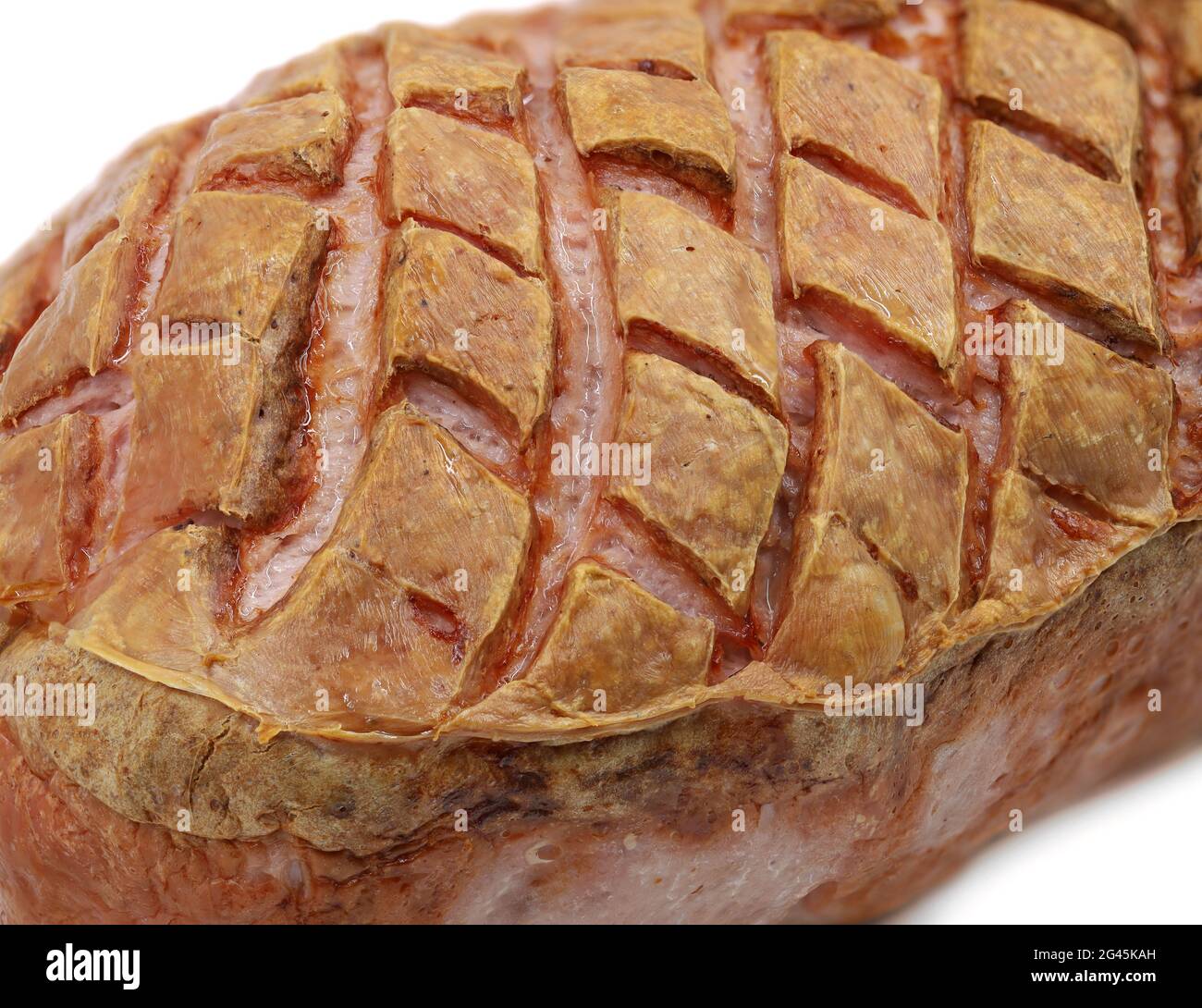 Nahaufnahme von frischer deutscher Leberkäsekruste, typischer bayerischer Fleischkuchen als Hintergrund Stockfoto
