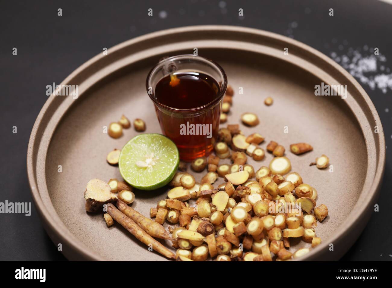 In der Nähe von Slice Kaempfers mit Honig und Limette. Stockfoto