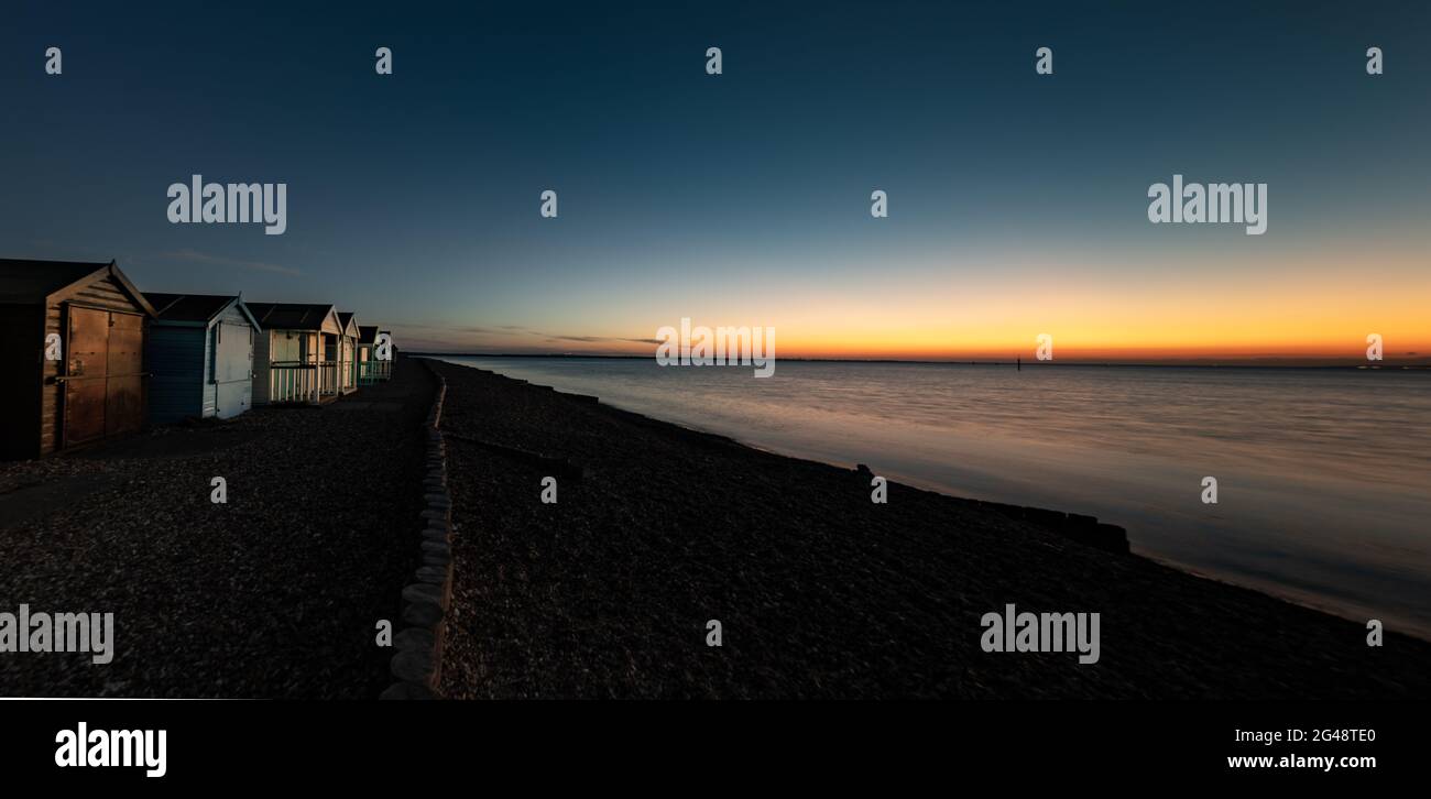 Strandhütten in Calshot Stockfoto