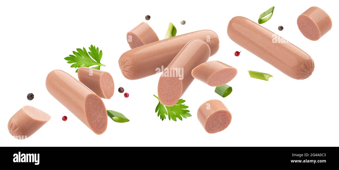 Fallende gekochte Würste isoliert auf weißem Hintergrund Stockfoto