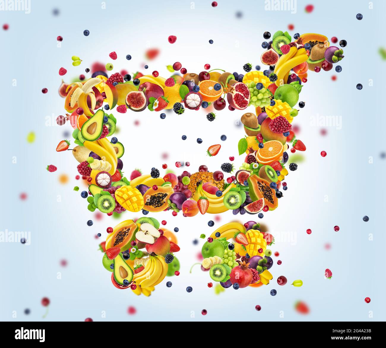 Lebensmittelwagen aus frischen fallenden Früchten isoliert auf weißem Hintergrund Stockfoto