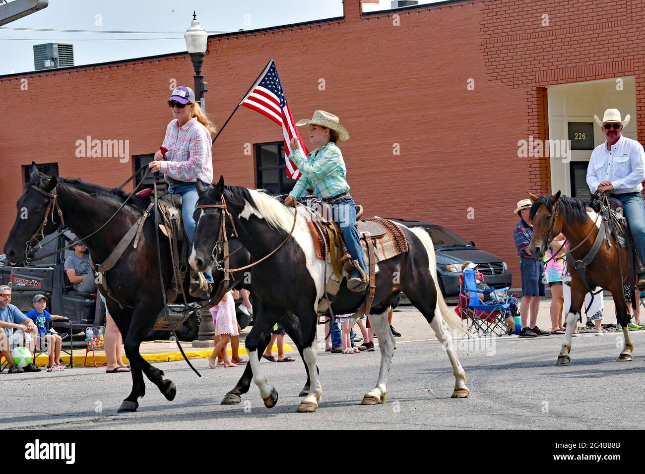 Mitglieder des Local 4 H Clubs reiten in der Council Grove Washungas Days Parade 19. Juni 2021. Kredit: Mark Reinstein/MediaPunch Stockfoto