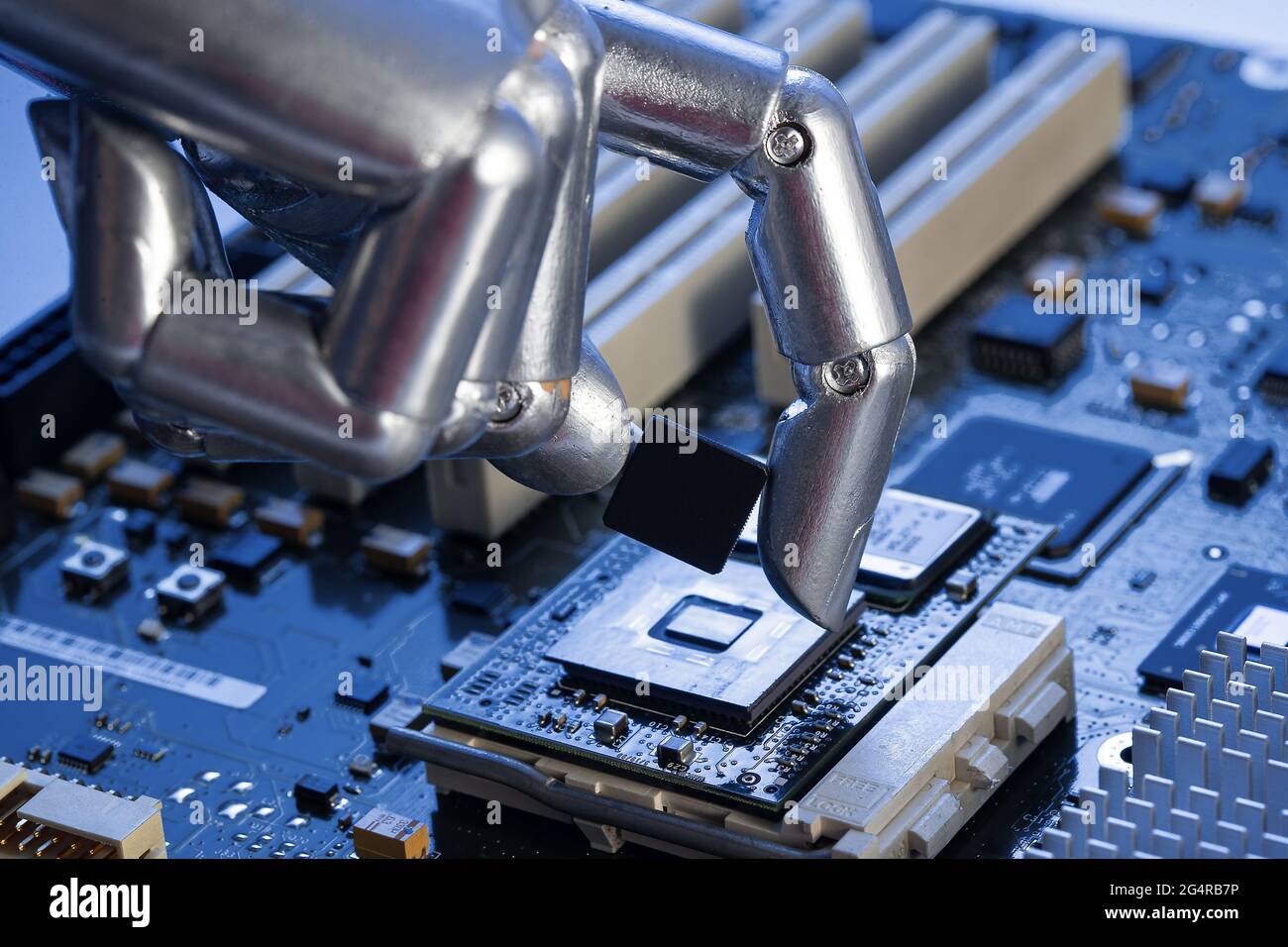 Leiterplattenchips und Manipulator Stockfoto