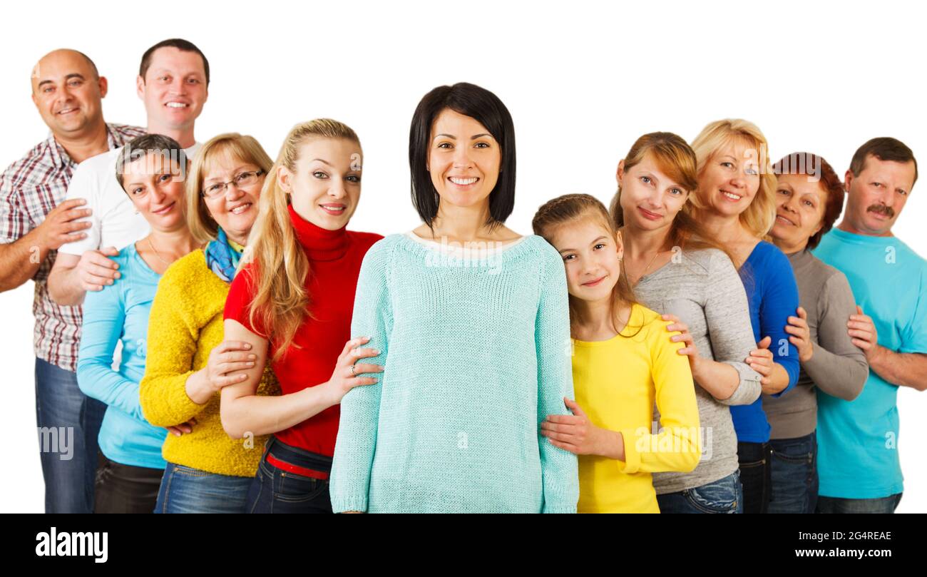 Porträt einer Vielfalt Mixed Age und einer Familie mehrerer Generationen, die sich zusammenschließt und zusammensteht. Isoliert auf weißem Hintergrund. Stockfoto