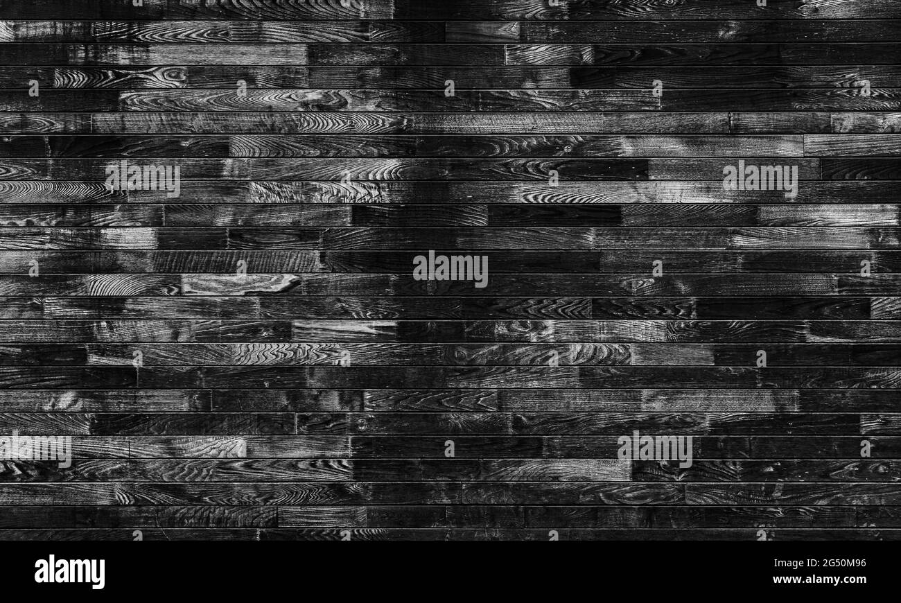Raue alte schwarze Holzwand Hintergrundstruktur Stockfoto