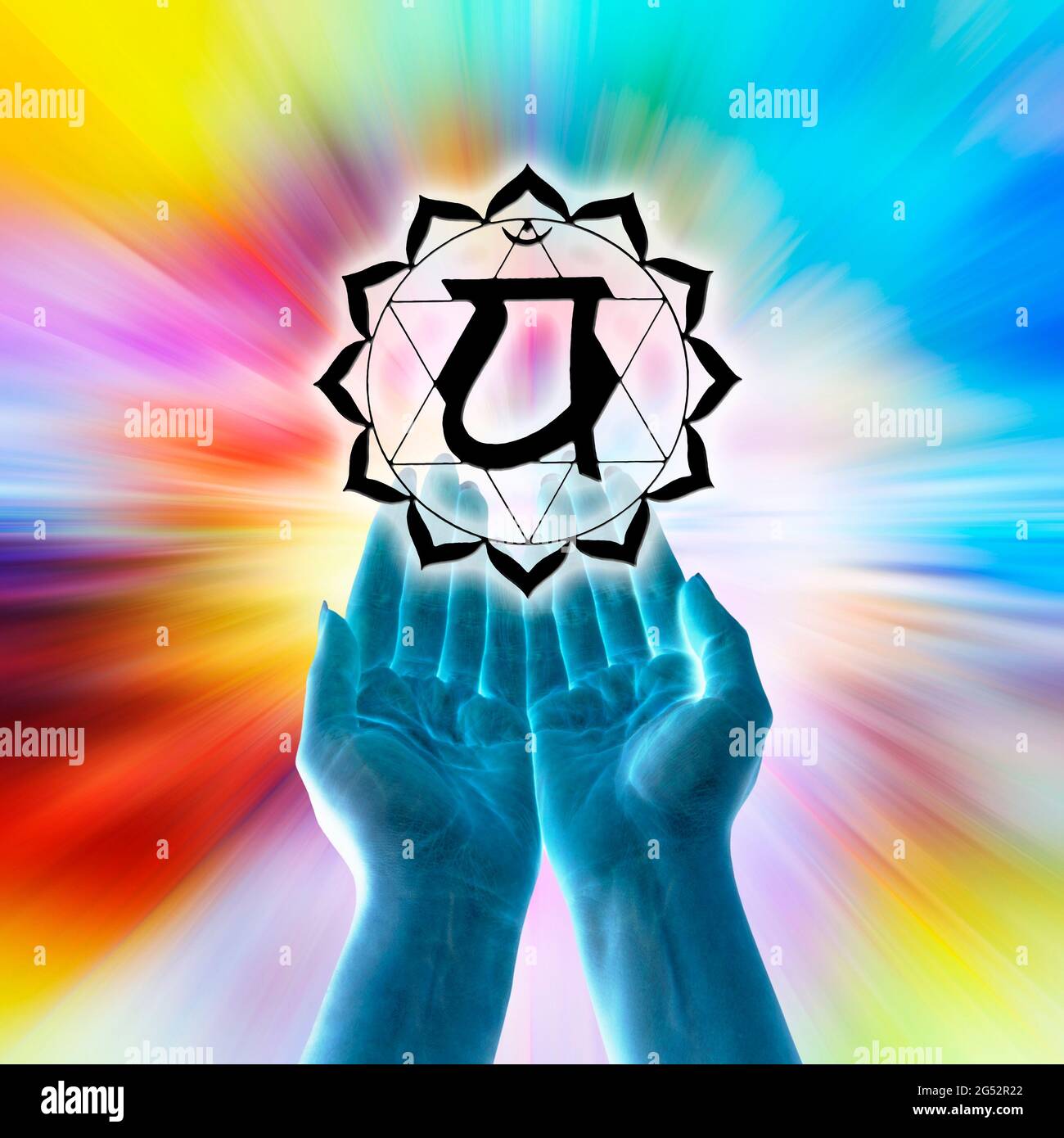 Offene Hände und Chakra-Symbol von Anahata Stockfoto