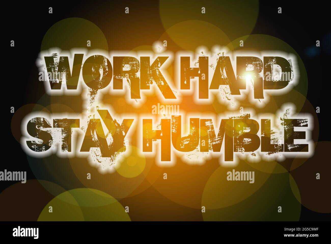 Arbeiten Sie hart bleiben bescheiden Konzept Text auf Hintergrund Stockfoto