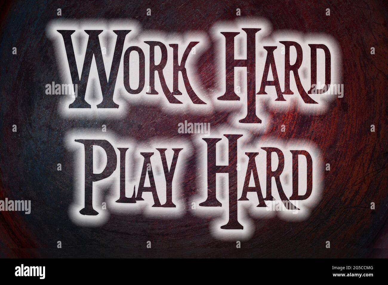 Work Hard Play Hard Konzept Text auf dem Hintergrund Stockfoto