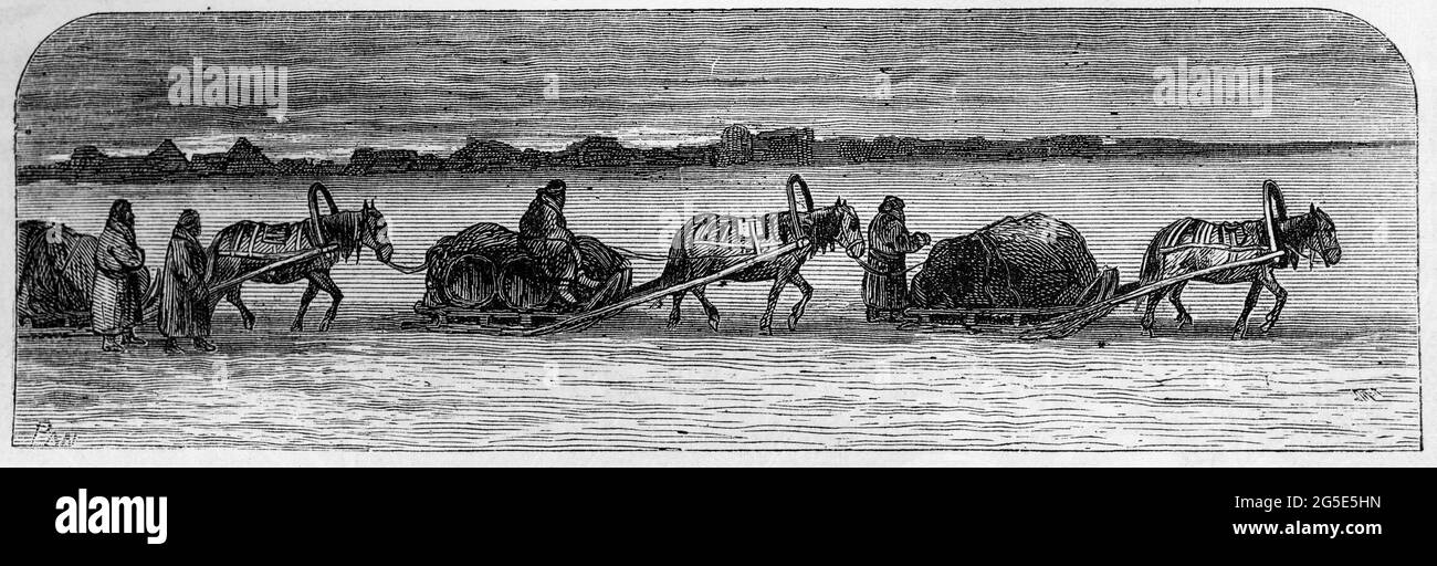 Gravur einer Gruppe von Menschen, die Waren mit Pferden und Schlitten über den Schnee transportieren Stockfoto