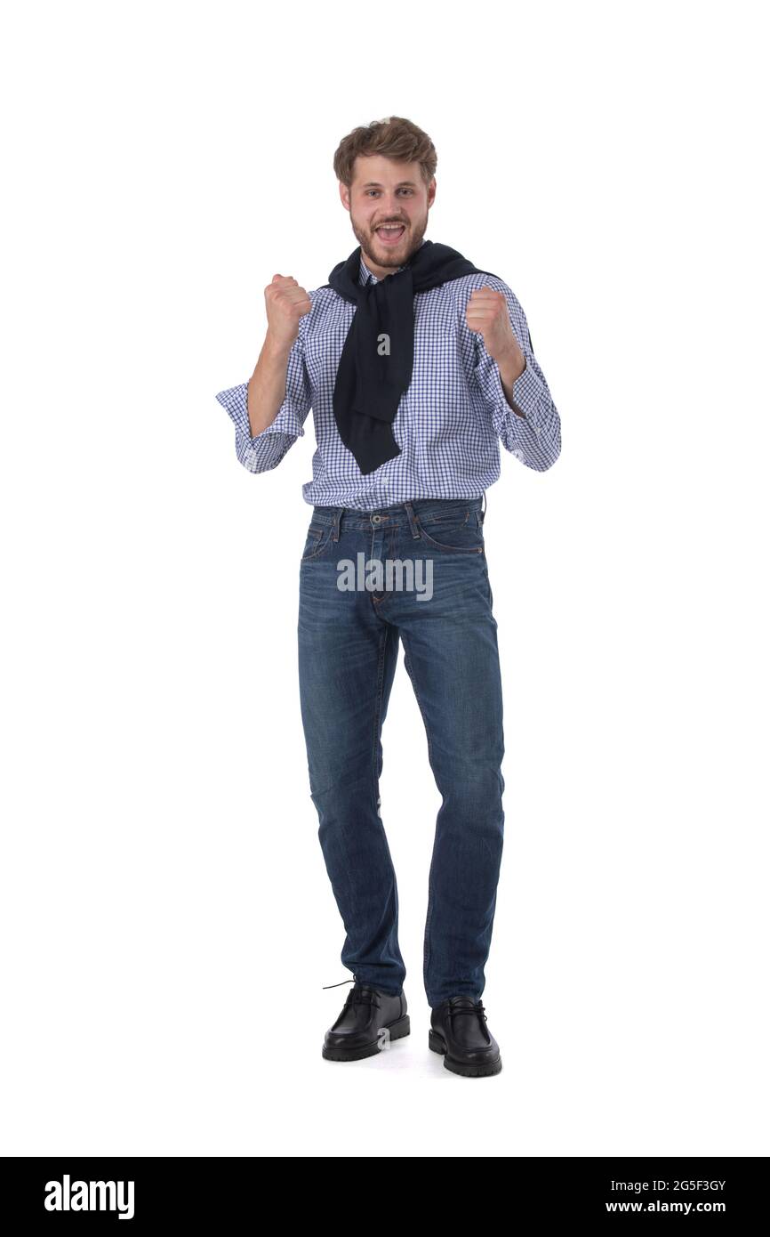 In voller Länge Porträt eines glücklichen Mannes mit ja Geste hält Fäuste Stockfoto