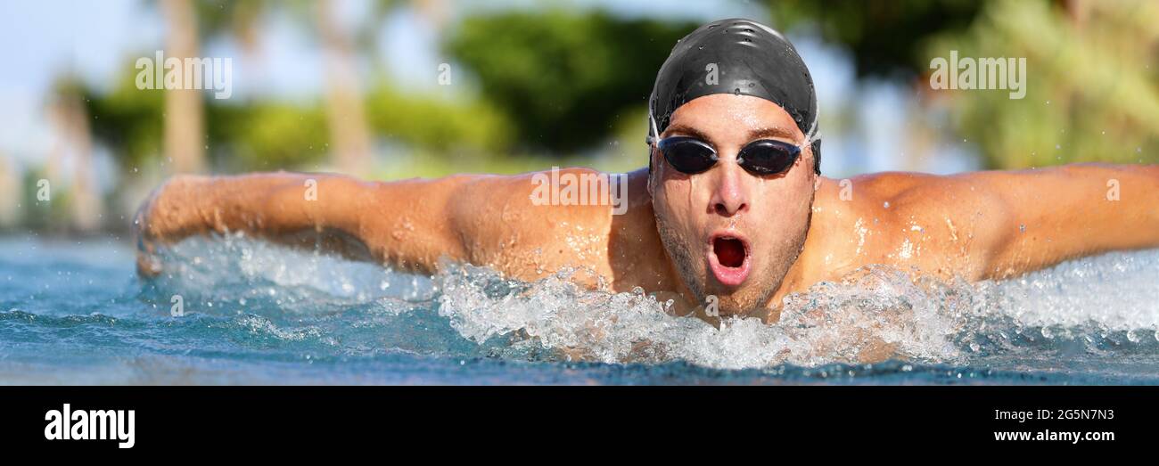 Mann Schwimmer schwimmen Schmetterling Schlaganfälle im Pool Stockfoto