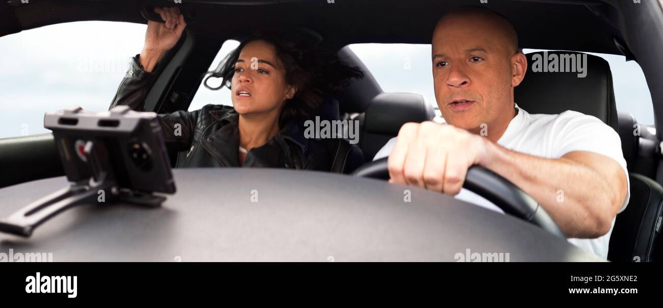 Fast & Furious 9 (2020) unter der Regie von Justin Lin und mit Michelle Rodriguez als Letty und Vin Diesel als Dominic Toretto. Der Cyber-Terrorist Cipher Cipher sucht die Hilfe von Jakob, Doms jüngerem Bruder, um sich an Dom und seinem Team zu rächen. Stockfoto